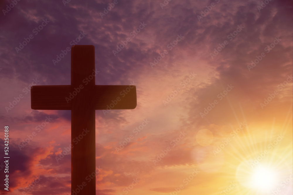 Silhouette of cross against beautiful sky at sunset. Christian religion Silhouette of cross against beautiful sky at sunset. Christian religion