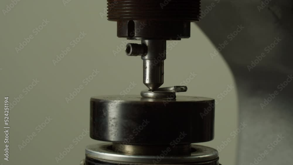 Worker installs small metal ring to process with milling machine in workshop extreme close view. Steel details making Worker installs small metal ring to process with milling machine in workshop extreme close view. Steel details making