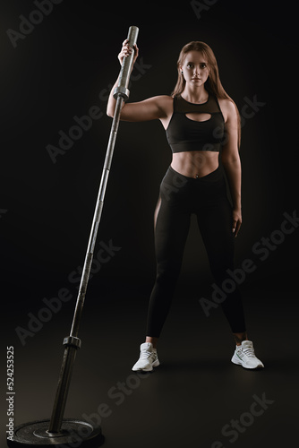 athletic girl with barbell © Andrey Kiselev