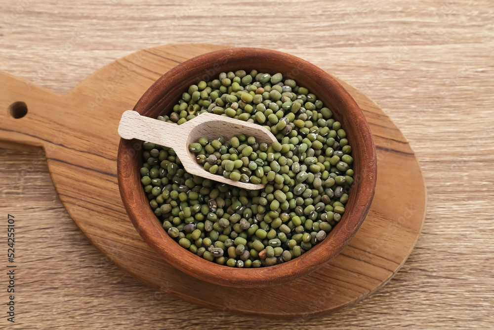 Group of green mung beans served on wooden bowl. Food preparation Group of green mung beans served on wooden bowl. Food preparation
