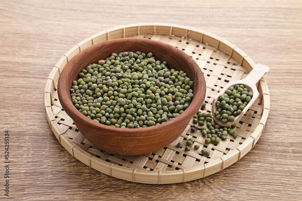 Group of green mung beans served on wooden bowl. Food preparation Group of green mung beans served on wooden bowl. Food preparation