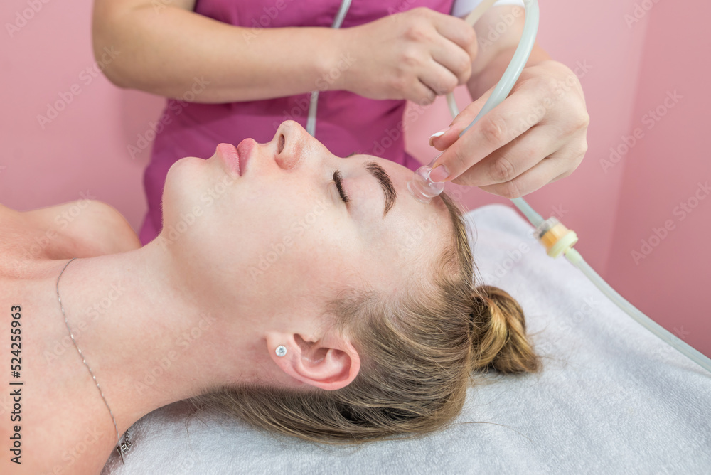 Fototapeta premium cupping facial massage, close-up.