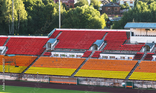 Empty multi-colored stands of the old stadium.