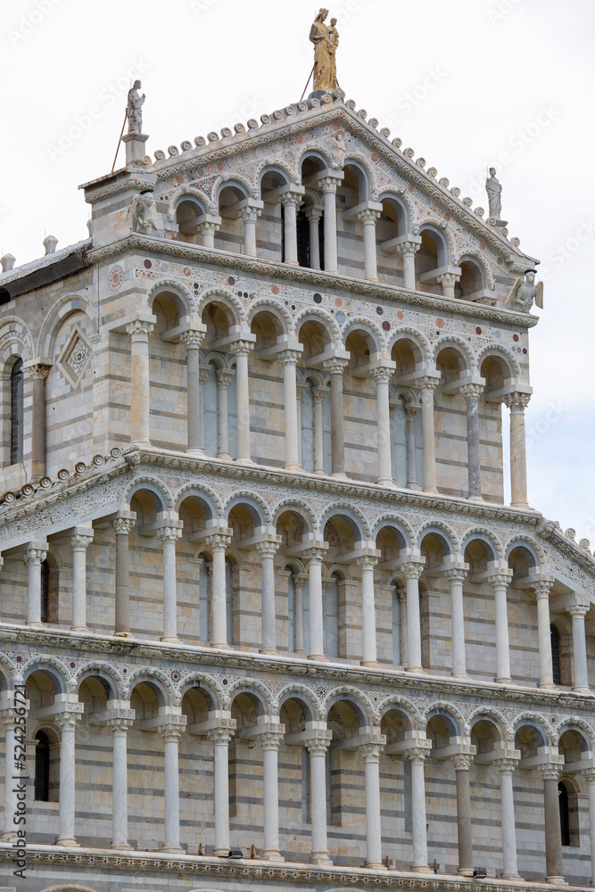 Facade of medieval Pisa Cathedral in the Piazza del Duomo, next to Leaning Tower of Pisa and Pisa Baptistery of St. John, Pisa, Italy. Facade of medieval Pisa Cathedral in the Piazza del Duomo, next to Leaning Tower of Pisa and Pisa Baptistery of St. John, Pisa, Italy.