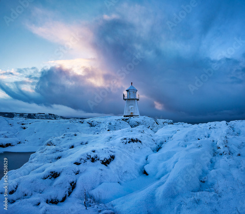 One of the lighthouses on Vigra during a winter sunset, Giske, Ålesund, Sunnmøre, Møre og Romsdal, Norway. photo