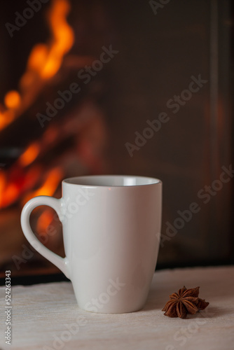 Warm tea by the fireplace.