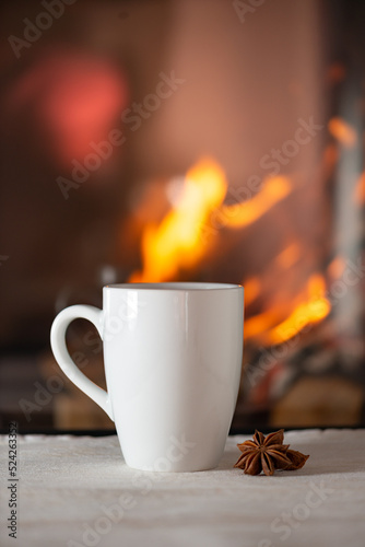 Warm tea by the fireplace.