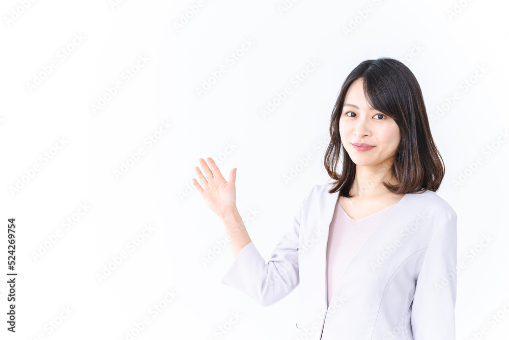 笑顔でご案内をする女性 笑顔でご案内をする女性