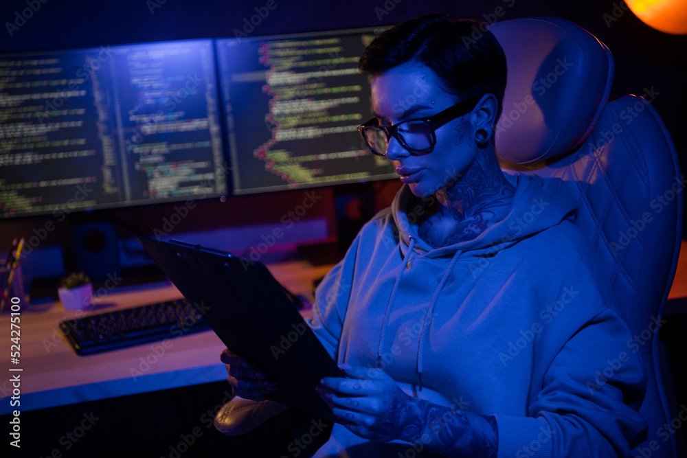Photo of serious busy online worker wear hipster outfit glasses reading papers indoors workplace workshop Photo of serious busy online worker wear hipster outfit glasses reading papers indoors workplace workshop