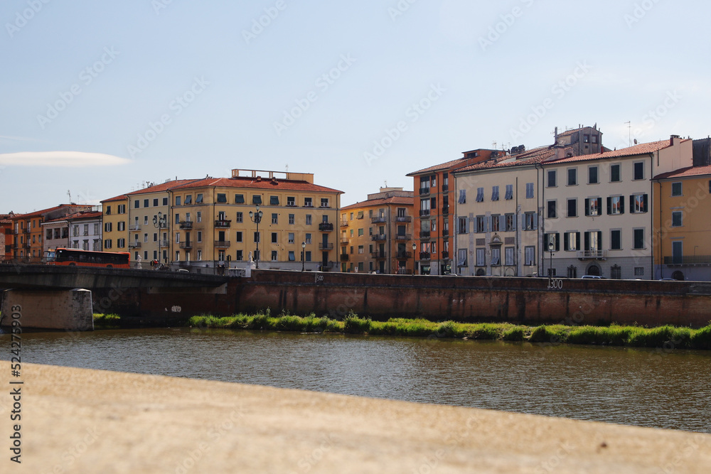 Old houses at the Arno river in Pisa, Italy	