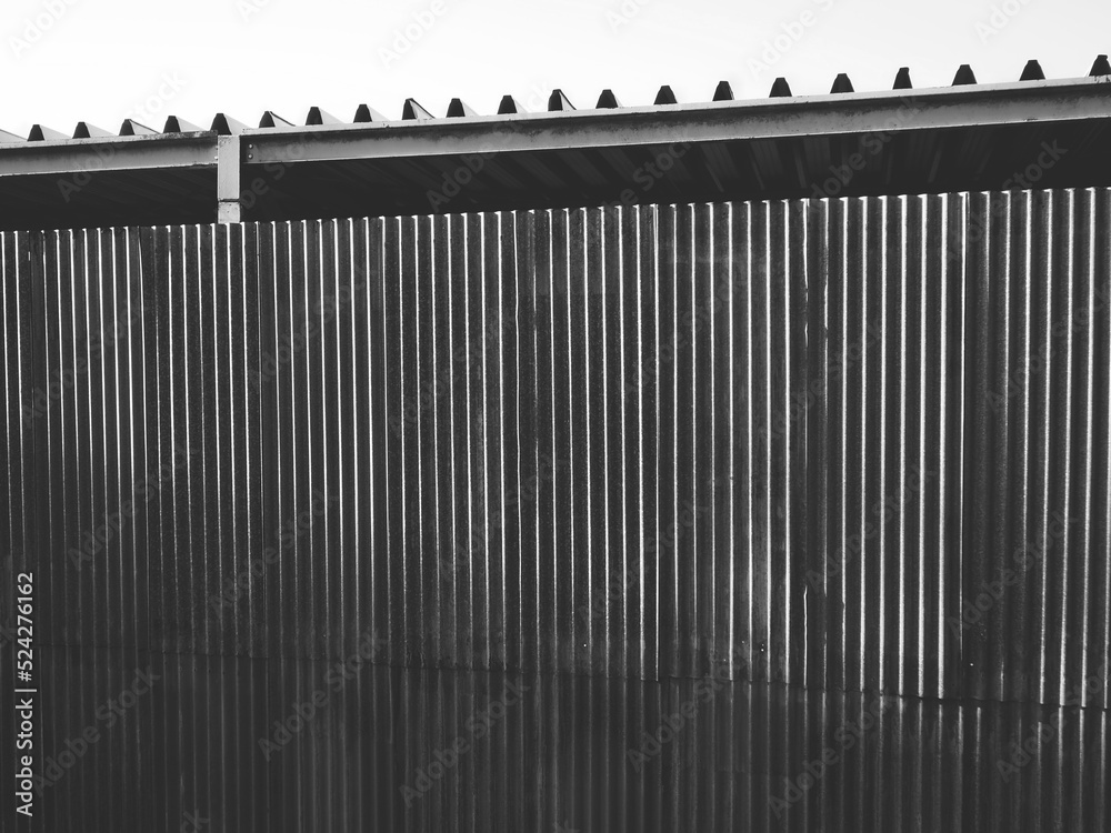 large metal fence, black and white photo, the old concept large metal fence, black and white photo, the old concept