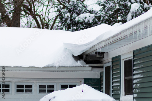 LArge amount of snow on a house after a blizzard