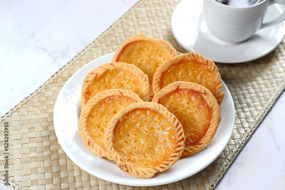 Pie Susu or custard tarts is popular snack from Bali, Indonesia.on white background 