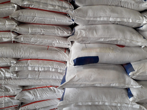 Chemical fertilizer The product stock is packed in sacks, stacked in the warehouse, waiting for delivery.