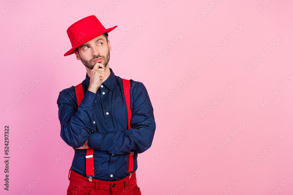 Portrait of minded person arm touch chin look interested empty space contemplate isolated on pink color background