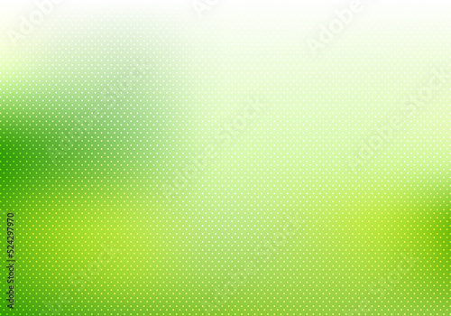 Abstract green nature blurred background with polka dots pattern