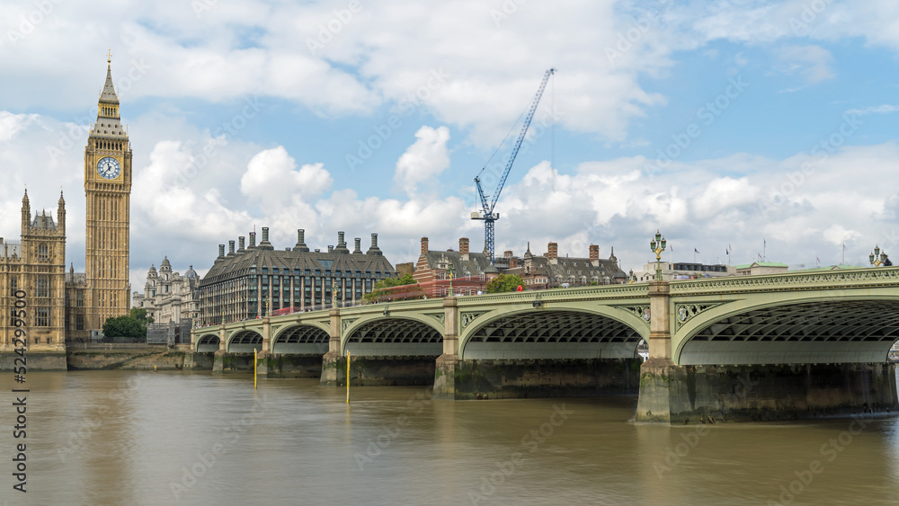 Fototapeta premium Houses of Parliament and Westminster Bridge in London on a cloudy day 