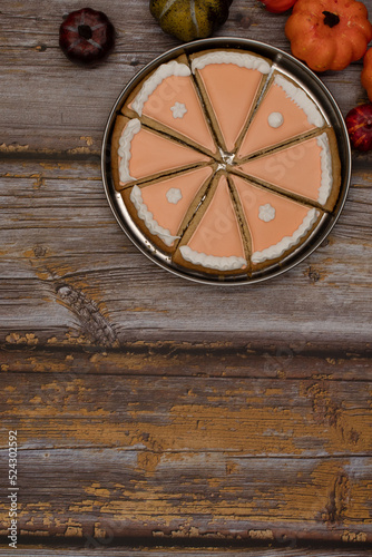 Pumpkin pie cookies on wooden rustic table copy space