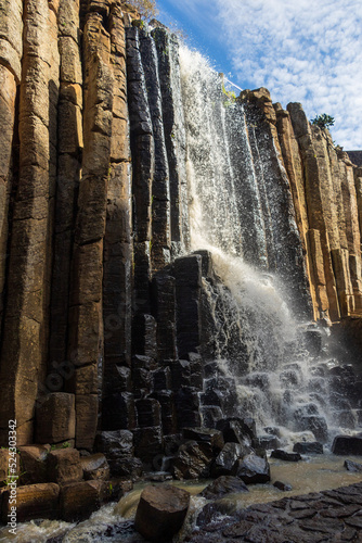 basaltic prisms with a waterfall