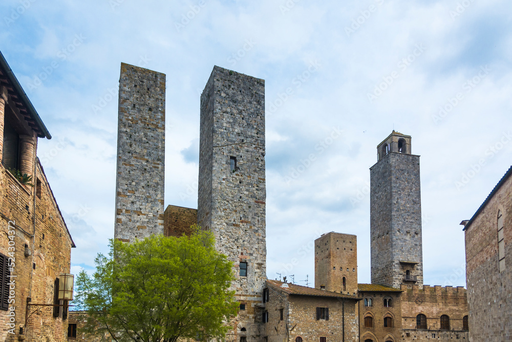 Towers against the blue sky in the city of San Gemignano, Tuscany, Italy.