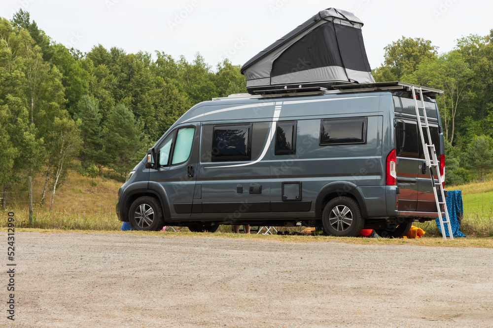 Camper van on a natural campsite in Sweden.
