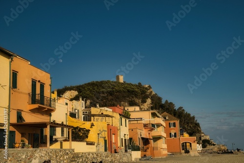 the beautiful Etruscan village of varigotti, with its yellow houses and its typical alleys