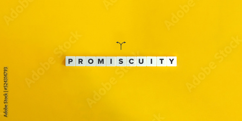 Promiscuity Banner. Block Letter Tiles on Yellow Background. Minimal Aesthetics. photo