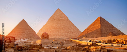 Banner view of famous wonder of world Sphinx and pyramids Giza, Egypt sunset