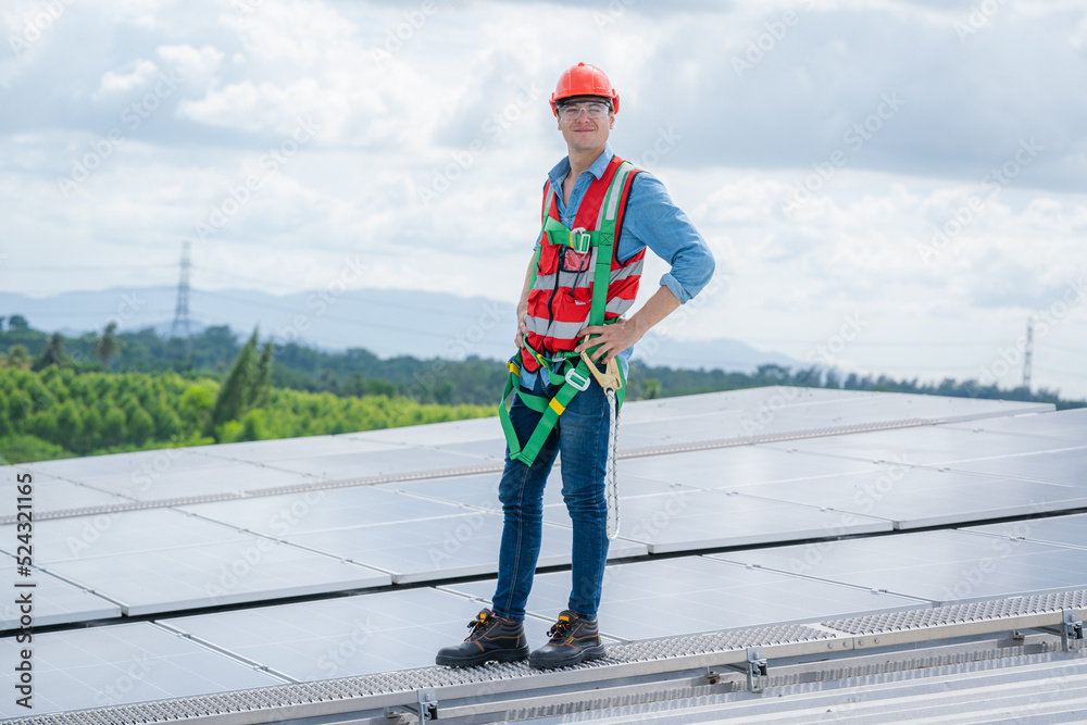 Technician checking Solar panel on top roof,Sun energy,Solar panel, Alternative electricity source,Concept of sustainable resources. Technician checking Solar panel on top roof,Sun energy,Solar panel, Alternative electricity source,Concept of sustainable resources.