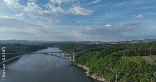 The Zdakov Bridge Steel Arch Bridge that spans the Vltava River,Czech Republic. Aerial View. Czechia, Europe. photo