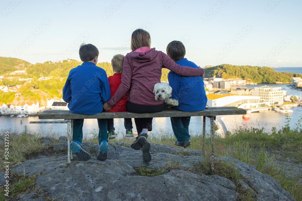 Family visiting town Mandal in Norway, view from the viewpoint Uranienborg to Mandal in Norway