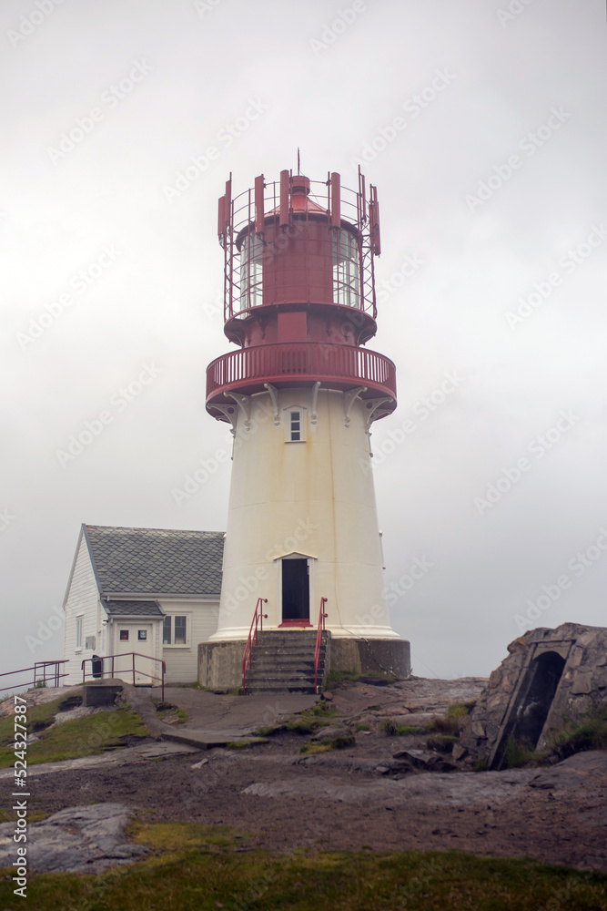 Lindesnes Fyr Lighthouse in Norway on rainy cold day