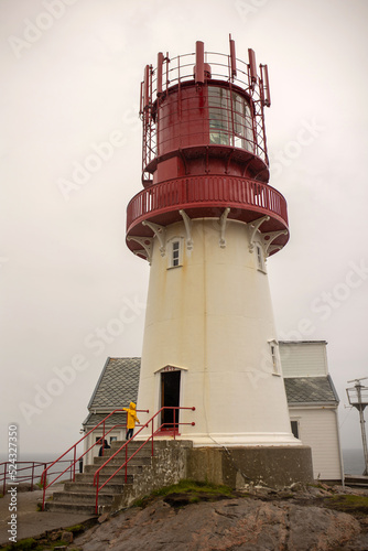 Lindesnes Fyr Lighthouse in Norway on rainy cold day