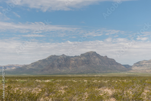 Scenic distant Organ Mountains vista under dramatic monsoonal sky, south east New Mexico