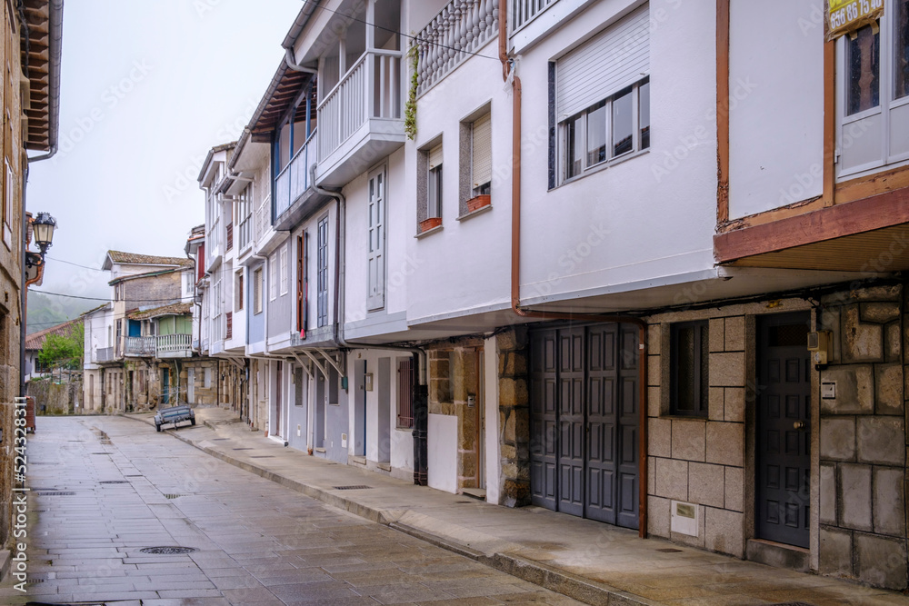 One of the old streets with traditional Galician architecture in the village of Celanova, in Ourense (Spain)