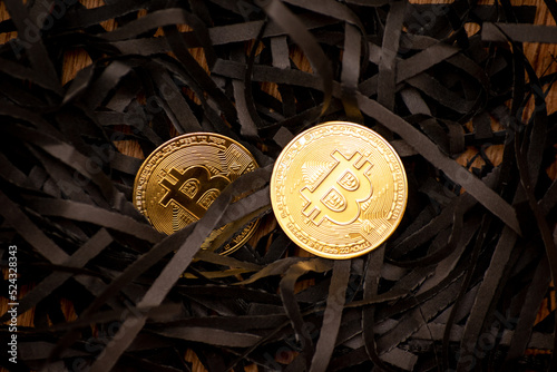Bitcoin on a black background with reflection