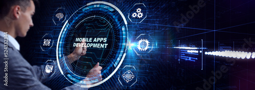 Inscription MOBILE APPS DEVELOPMENT on the virtual display. Cloud technology concept.