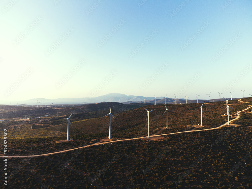 Windmills on a blue sky.