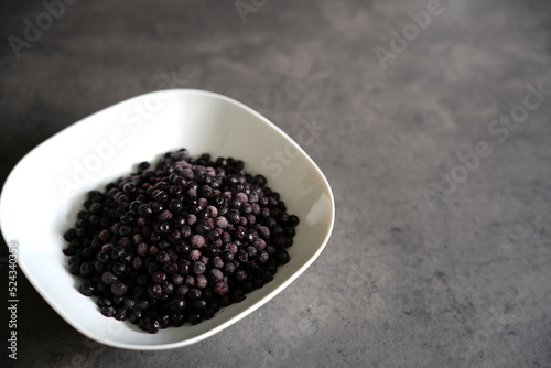 Closeup of blueberries, blackberry in bowl