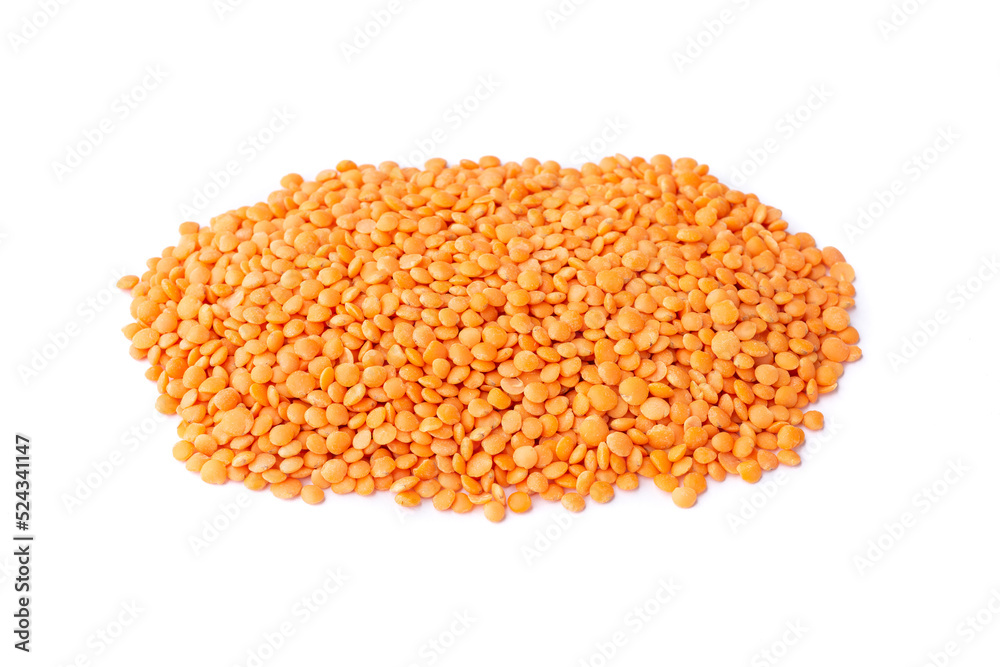 A pile of orange lentil isolated over white background A pile of orange lentil isolated over white background