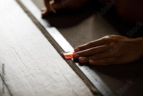 fabric marking hands ruler seamstress