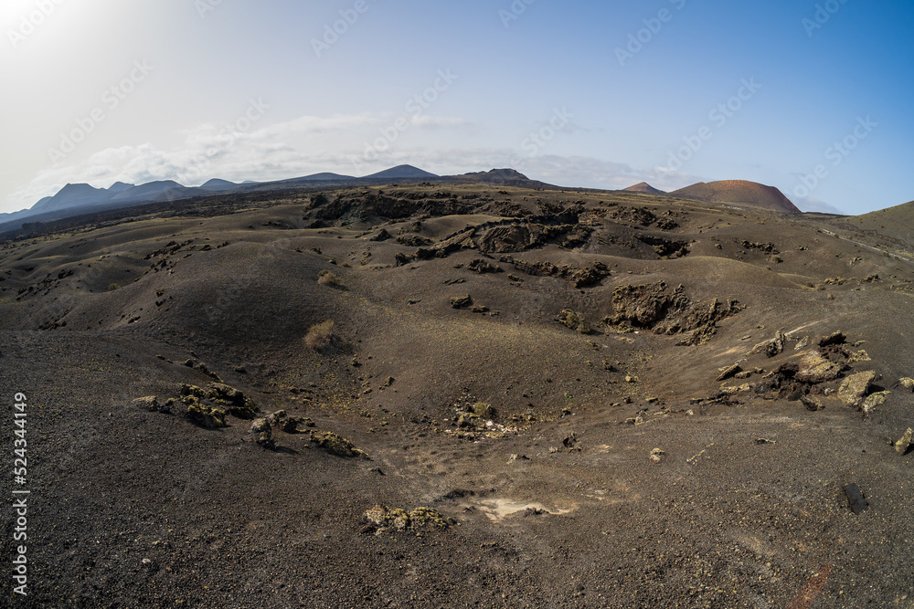 Typical volcanic landscape in the area of Caldera de Los Cuervos. Lanzarote, Canary Islands. Spain.