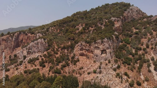 Aerial view of ancient lycian tombs carved into the rock for the nobility, Turkey