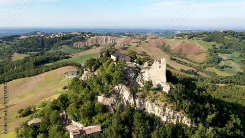 Aerial view of Canossa Castle in summer. The castle is located near Reggio Emilia, Emilia Romagna, Northern Italy photo