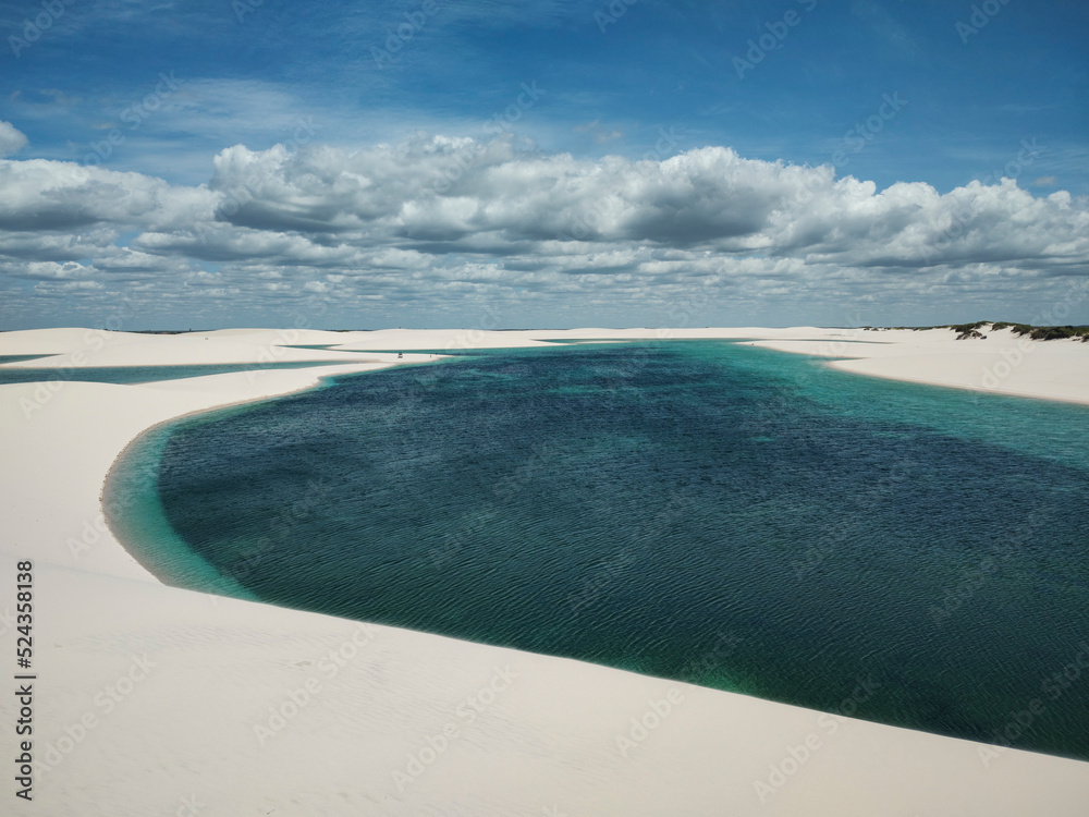 Beautiful view to blue rainwater lagoon and white sand dunes - obrazy, fototapety, plakaty 