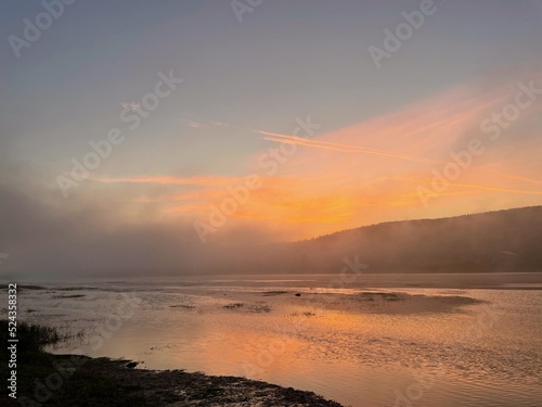 Sunrise and fog above the river © Cavan