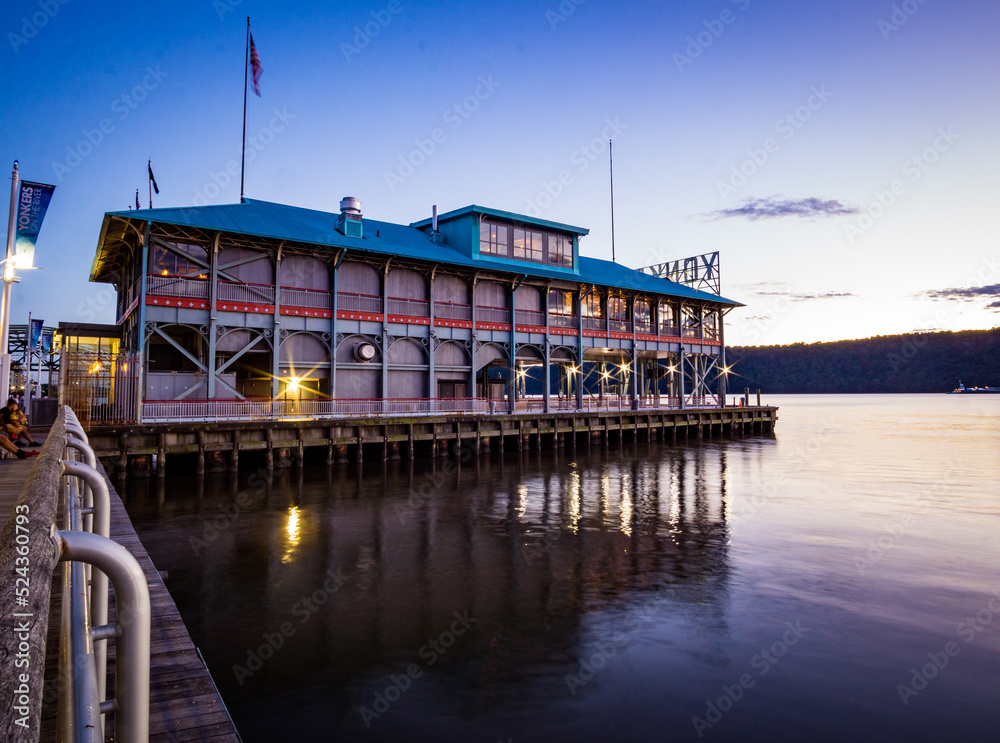Yonkers, NY - Aug 13, 2022 Landscape view of the iconic Yonkers Recreation Pier, located at the foot of Main Street in the Downtown Waterfront District.