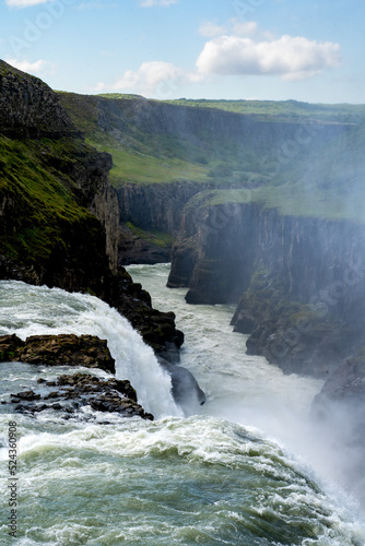 Golden Circle, Iceland - July 2, 2022 Vertical view of the iconic Gullfoss or golden falls. a waterfall located in the canyon of the Hvítá river in southwest Iceland.