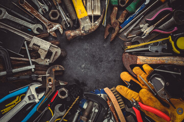 Collection of old and worn work tools with blank copy space for text. Home improvement, Father's day, or Labor day concept.
