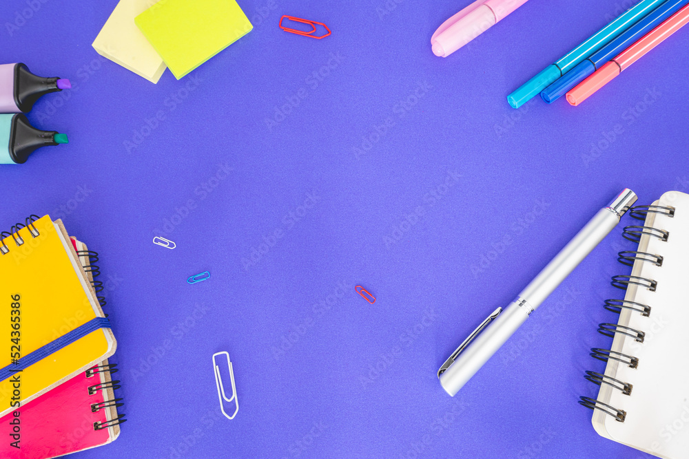 Flatlay from office and school stuff on a colour background. Flatlay from office and school stuff on a colour background.